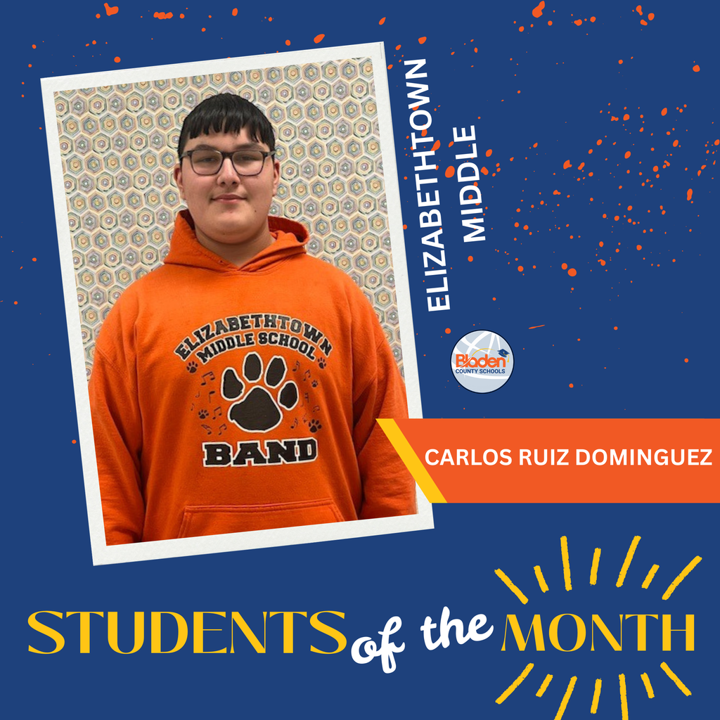 Graphic showing a student smiling and wearing an orange Elizabethtown Band hoodie while standing in a school hallway. The background includes blue and orange splatter accents with text reading ‘Elizabethtown Middle’ and ‘Students of the Month.’ A label identifies the student as Carlos Ruiz Dominguez.