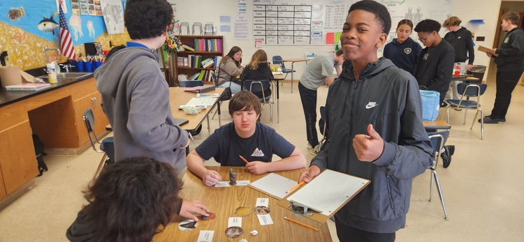 students working on science project
