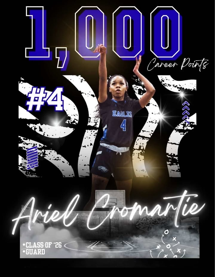 Photo shows Ariel Cromartie number four shooting a basketball, celebrating her thousand points career goal. It includes that she is the class of 26 and is a guard. 