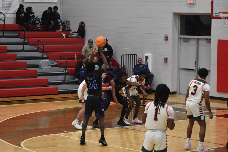 red bleachers, players on court, EB #14 shooting the ball