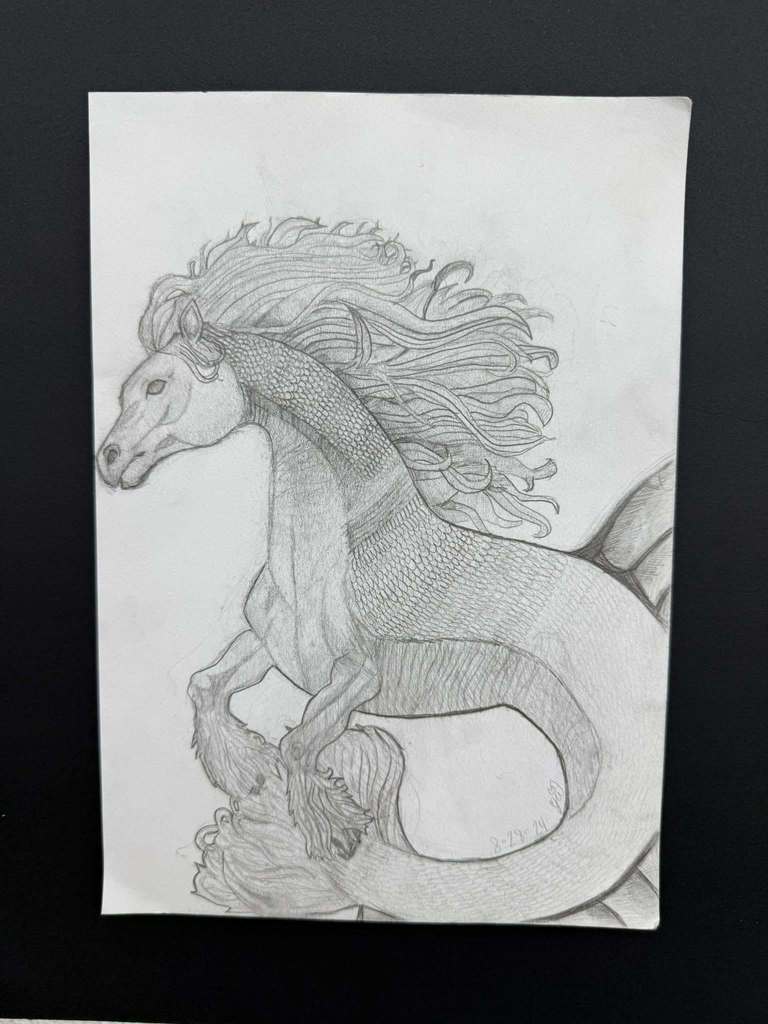 Detailed pencil drawing of a mythical creature with a horse’s head, flowing mane, scaled torso, wings, and a long curling tail.