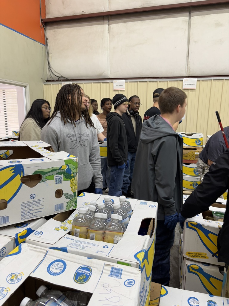 students helping to gather supplies