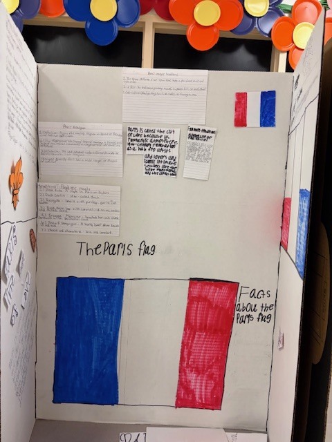 Student display board about France and the Paris flag, including facts about the flag and information about French history and culture.
