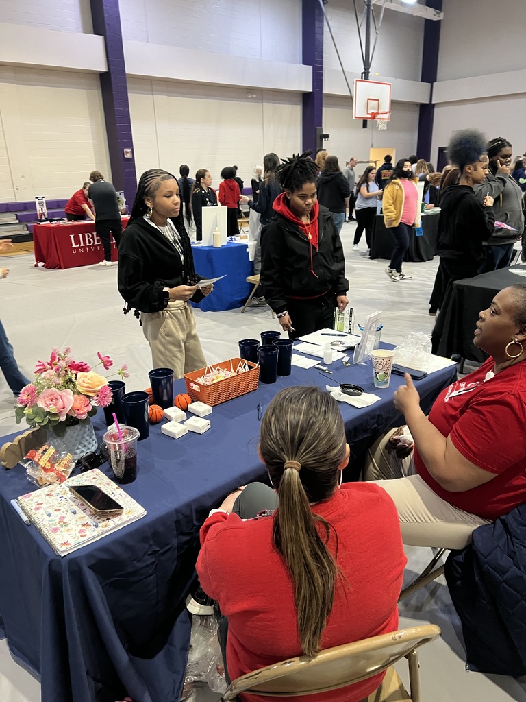 Students and community partners interact at the West Bladen CTE Career Fair held in a high school gymnasium