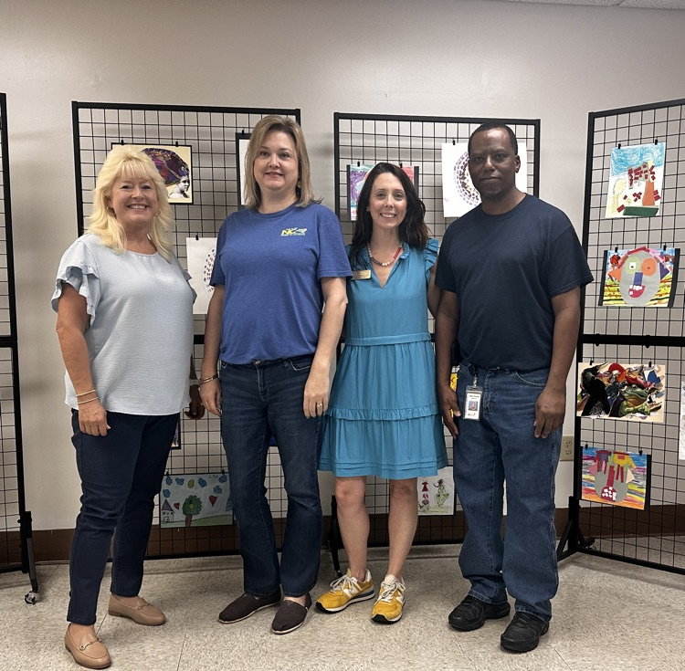 district administrators wearing blue