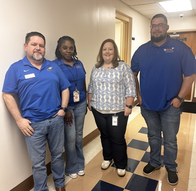 district administrators wearing blue