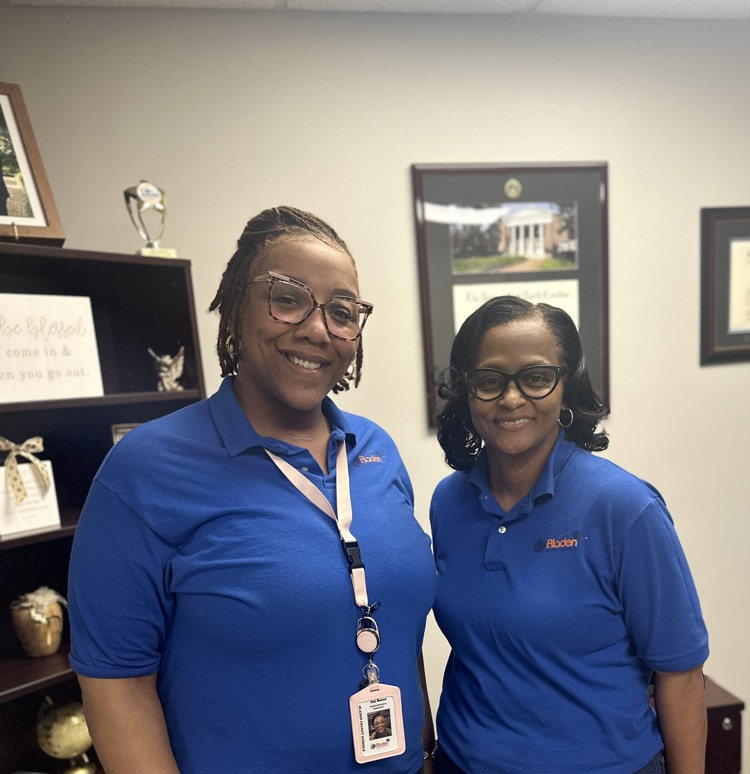 district administrators wearing blue