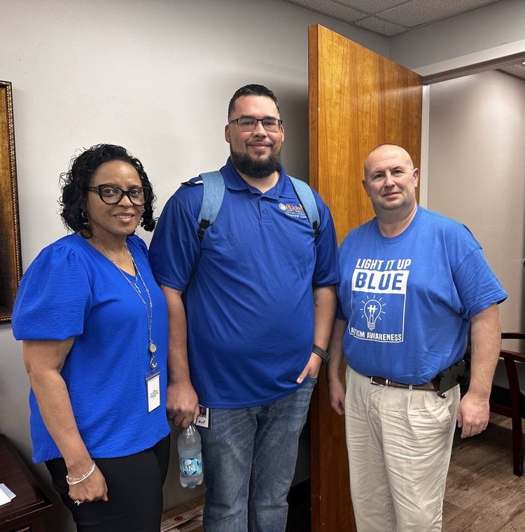 district administrators wearing blue