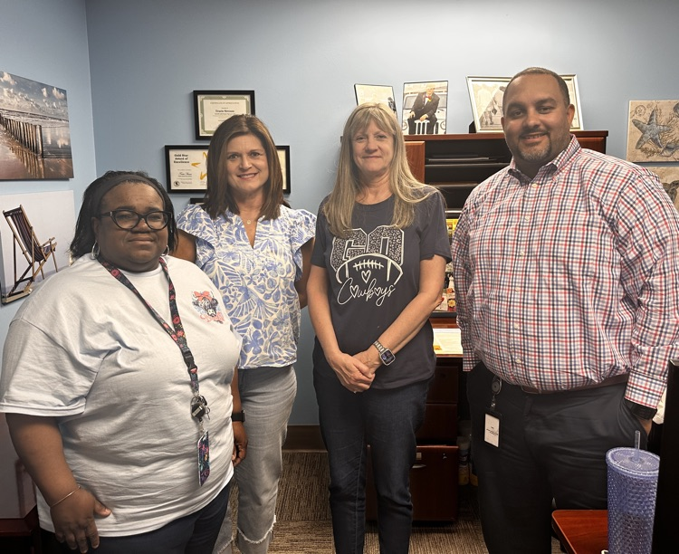 district administrators wearing blue