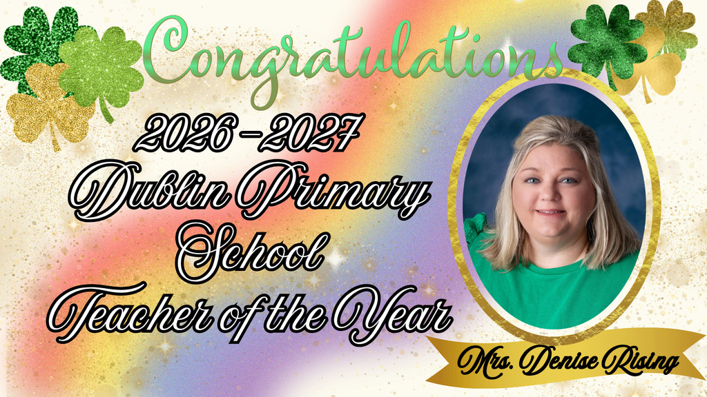A celebratory graphic with a rainbow background and glittery shamrocks that reads “Congratulations 2026–2027 Dublin Primary School Teacher of the Year.” On the right side is a portrait of Mrs. Denise Rising, framed in an oval with a gold border. A gold banner beneath the photo displays her name, “Mrs. Denise Rising.”