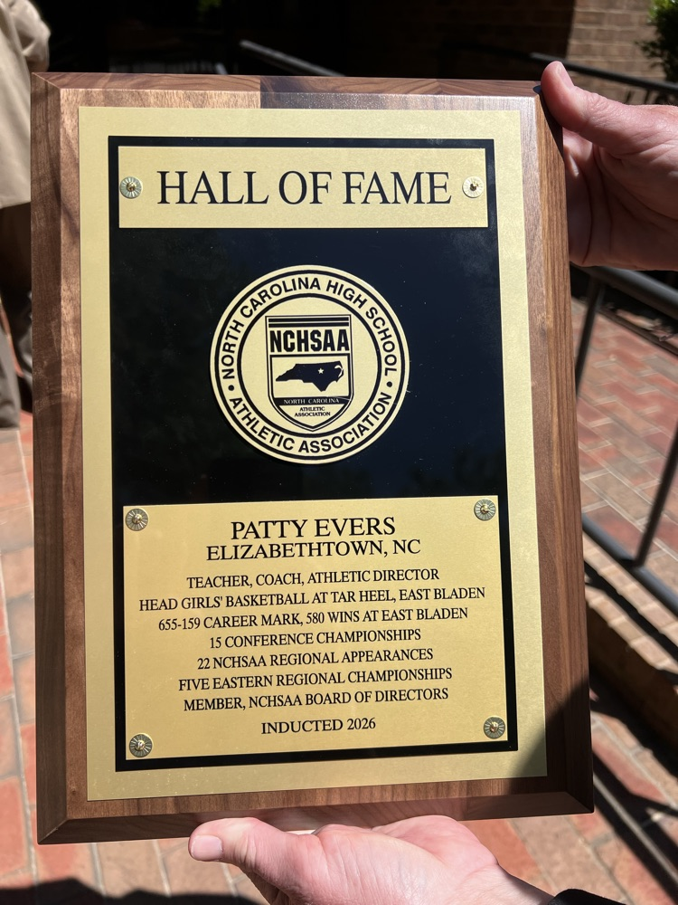 COACH PATTY EVERS’S HALL OF FAME PLAQUE THAT READS HER COACHING HISTORY