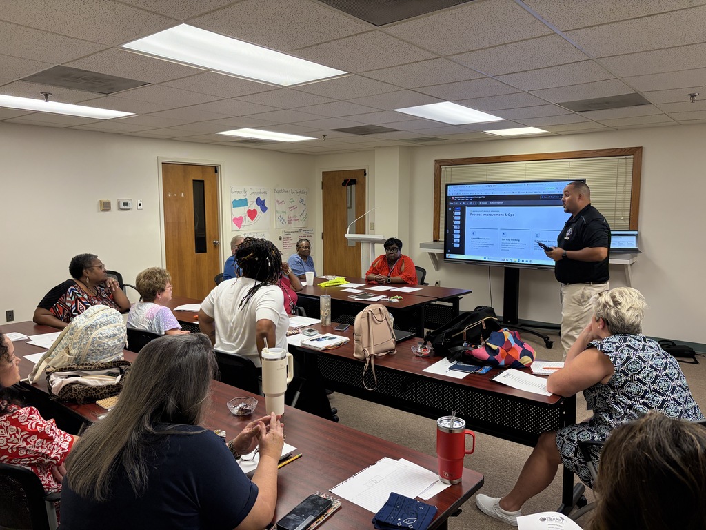 District bookkeepers attend training with finance staff.