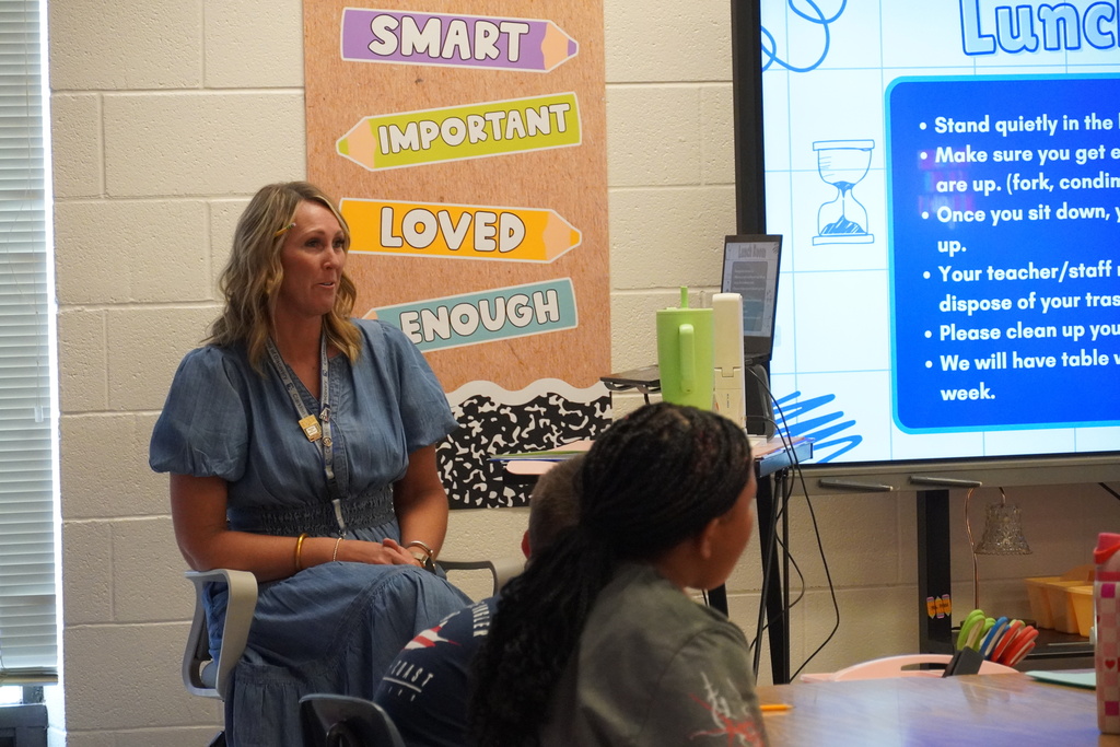 A teacher is going over classroom procedures with their class.