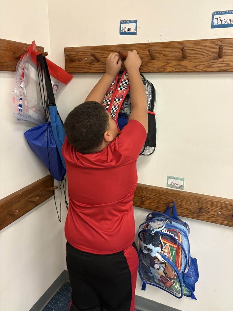 Students settle into the back-to-school routine by working at their tables, following directions, and participating in classroom activities.