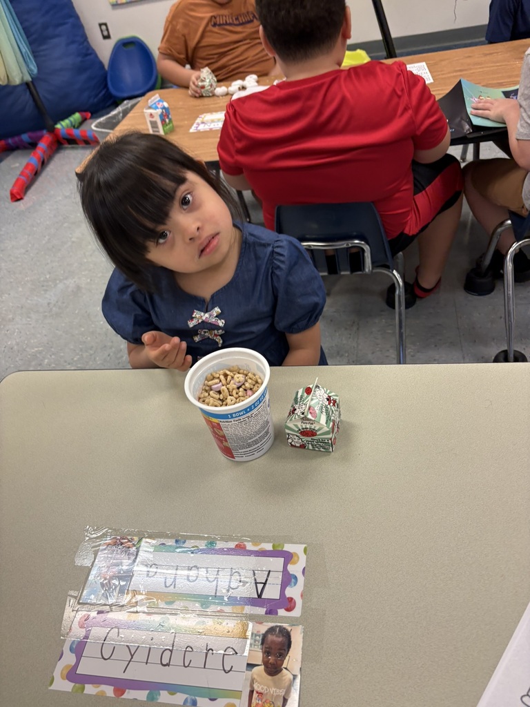 Students settle into the back-to-school routine by working at their tables, following directions, and participating in classroom activities.