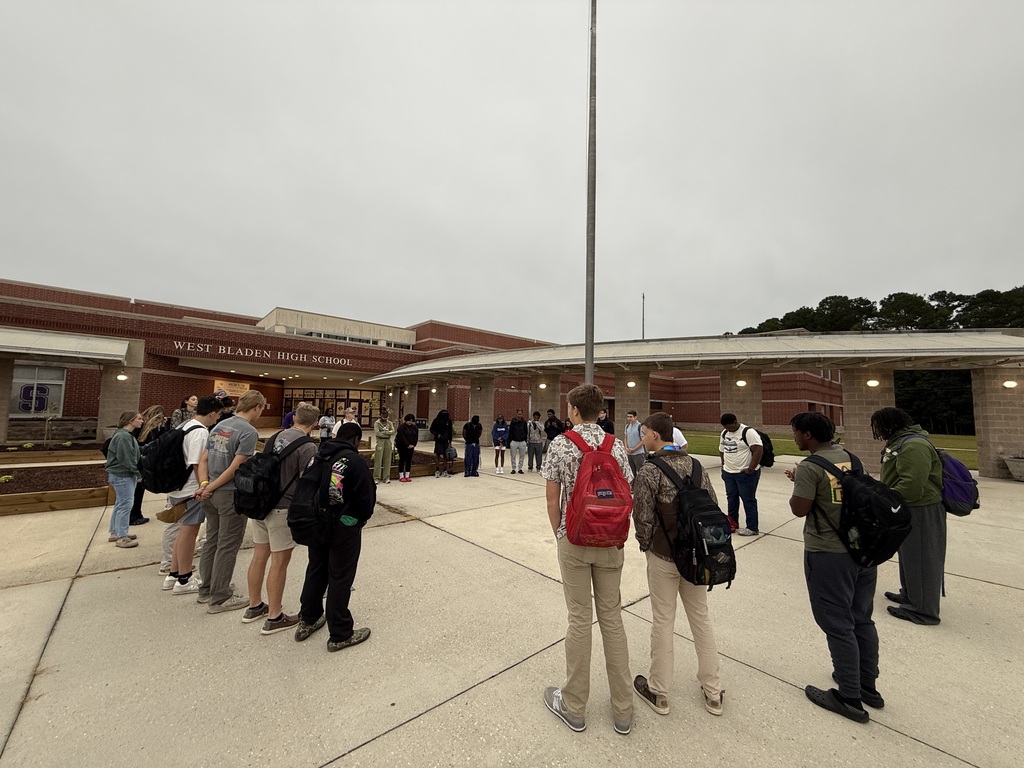 Students gathered outside West Bladen High School praying together during the See You at the Pole event.