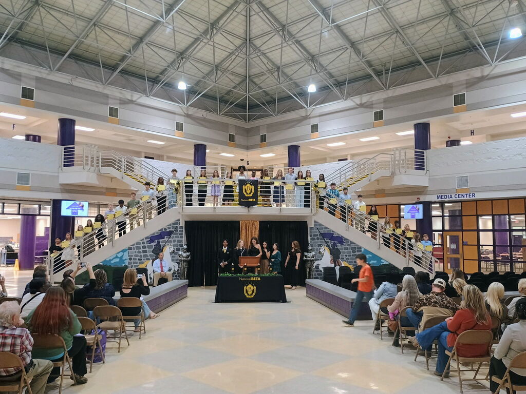 This image is of all the new inductees span across the stairs and landing. 