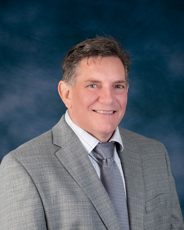 Professional headshot of David Wimert.