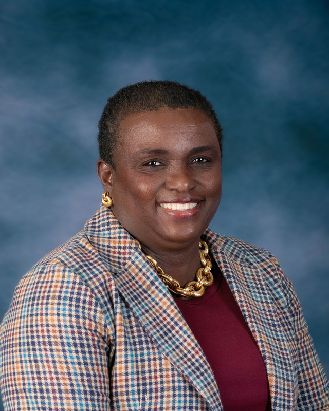 Professional headshot of Joyce Spencer.