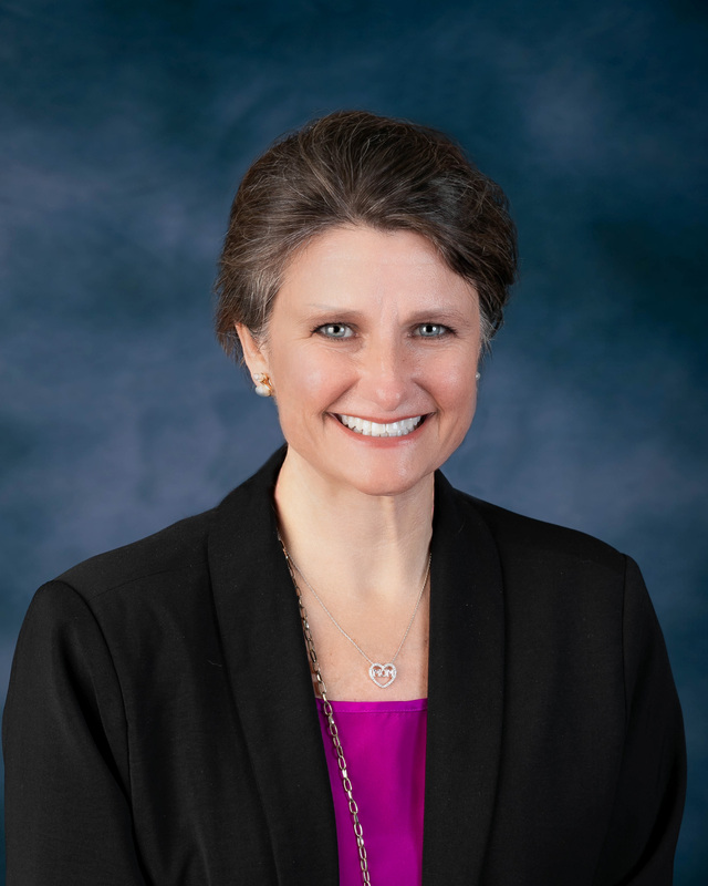 Professional headshot of Shannon Ross.
