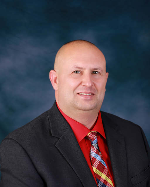 Headshot of superintendent Jason Atkinson.