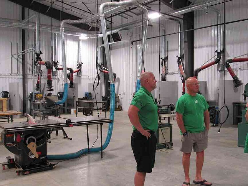 Maddie Madison/News Tribune photo: Blair Oaks R-2 School District board members Luke Fitzpatrick, left, and John Weber admire the new agriculture building Tuesday, Sept. 1, 2026, during an open house in Wardsville.
