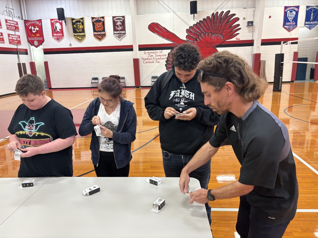 Teachers and Students Opening Master Locks 