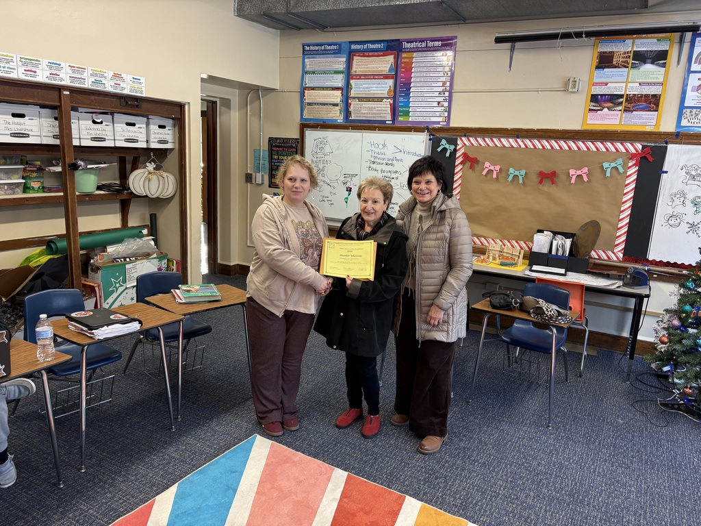 Mrs. Whetstone receiving award