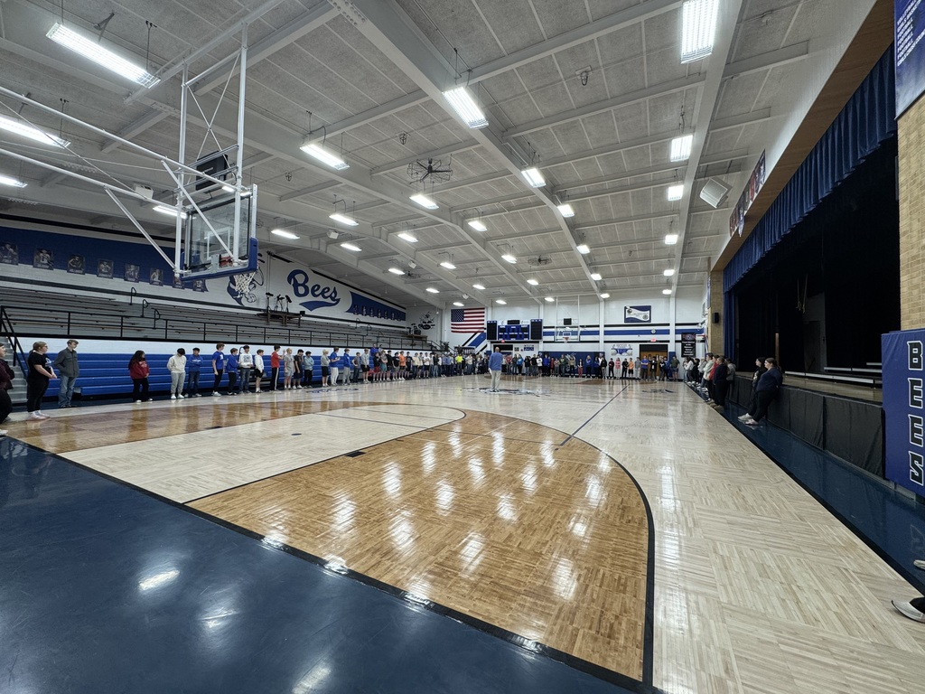 BHS Gym with students and superintendent relaying accomplishments