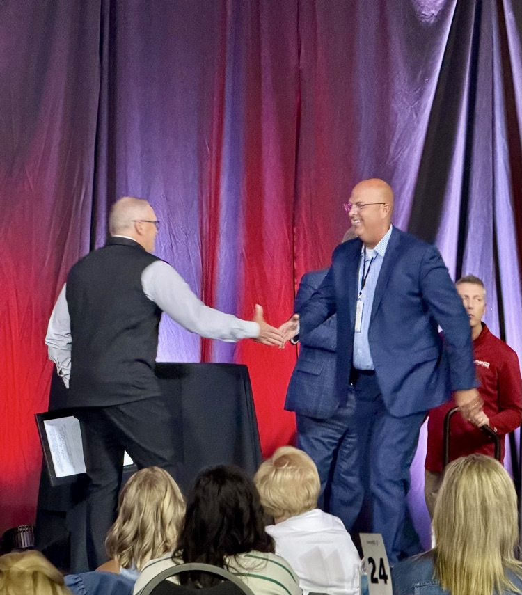 Todd Strom shaking hands