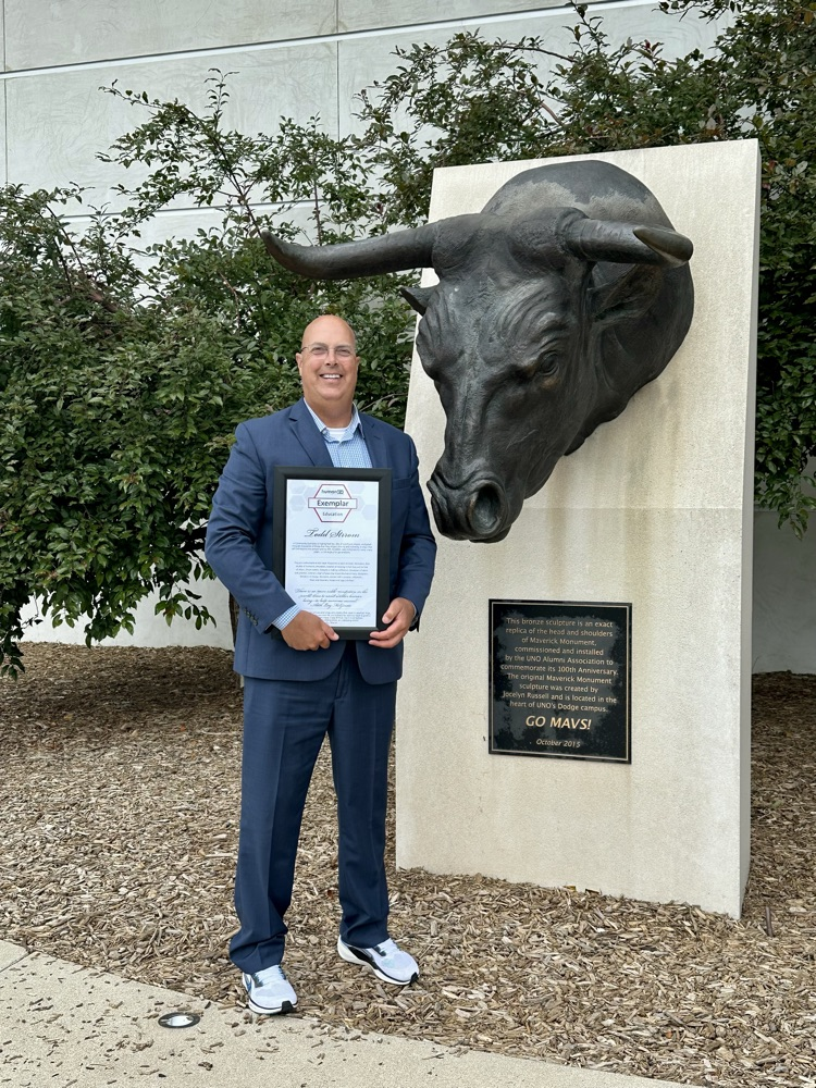 Todd Strom with his award