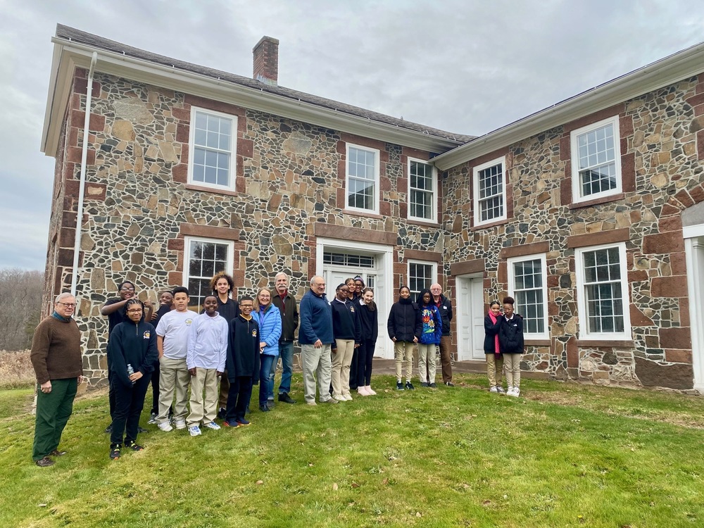 Students standing in front of the Filley house