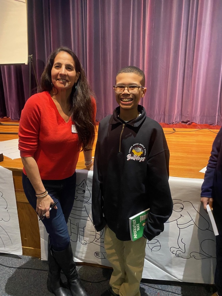 Author with a student and his signed book