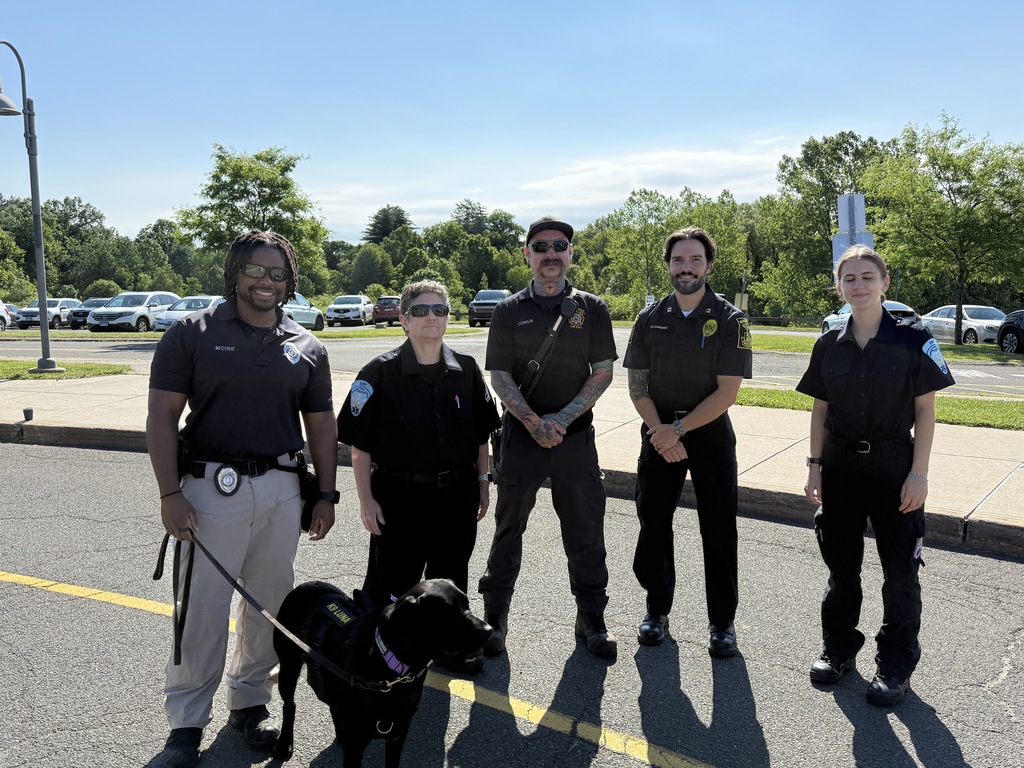 Three men and two women who are in uniform for emergency services.
