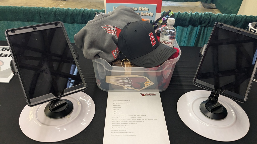 Cardinal prize basket including spirit wear, school supplies, and other items.