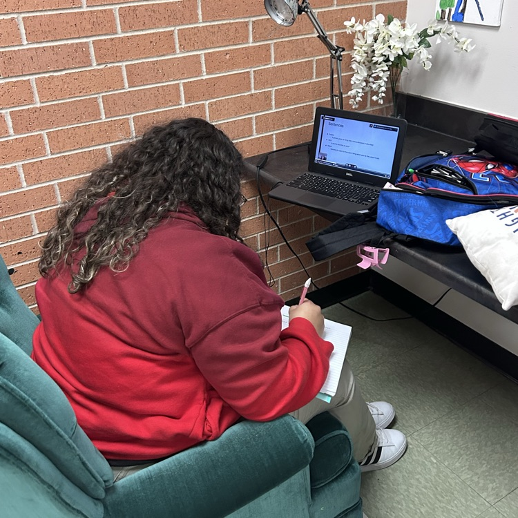 student works on comfortable chairs