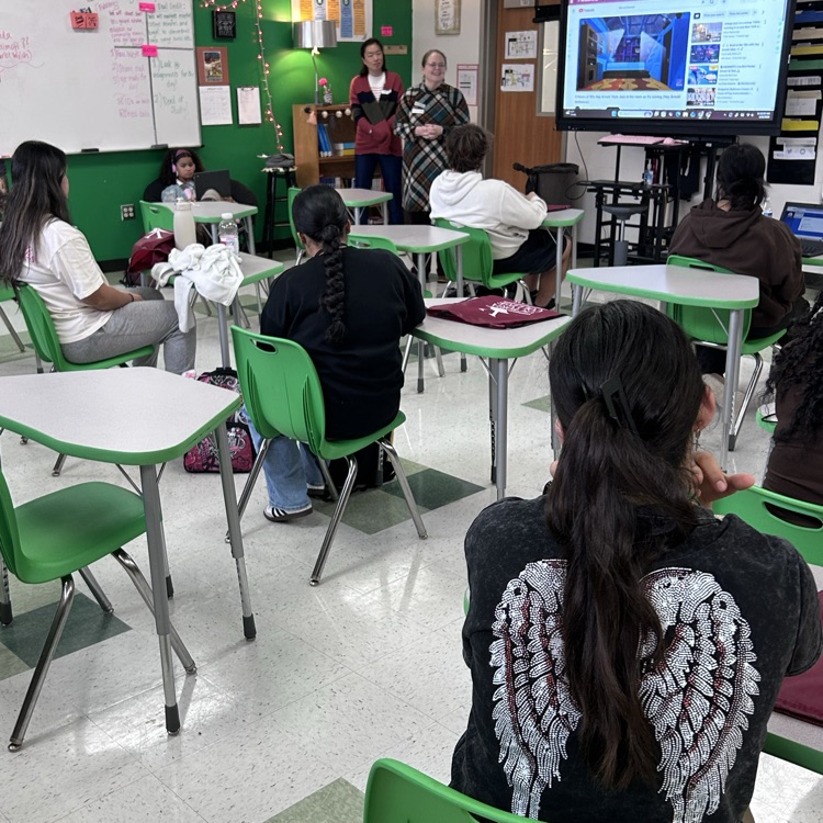 students listening to professors