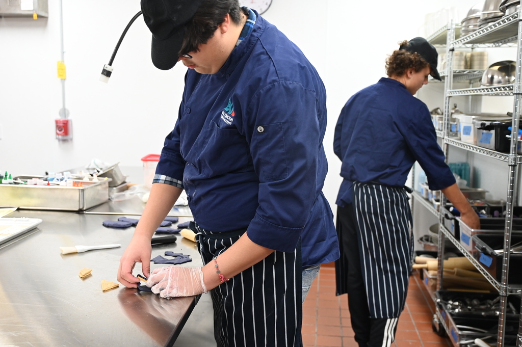 BCA Culinary Class working on gingerbread houses