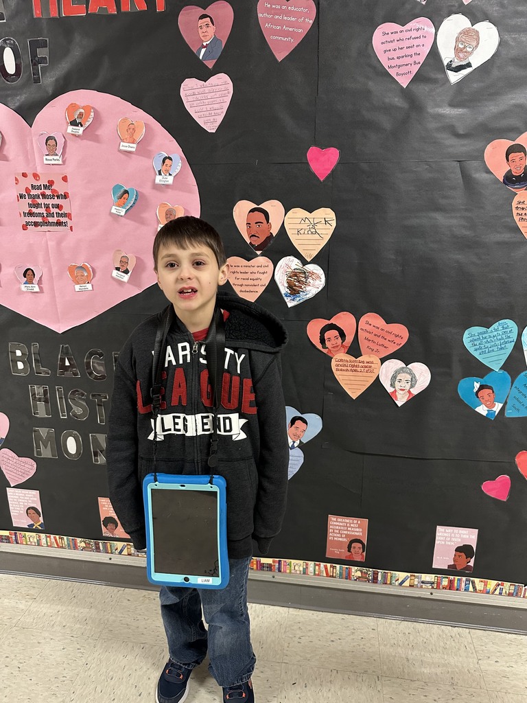 Liam in front of display