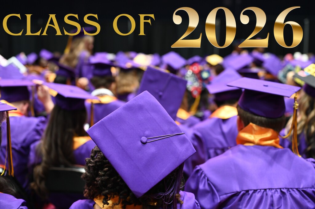 Class of 2026 photo with caps