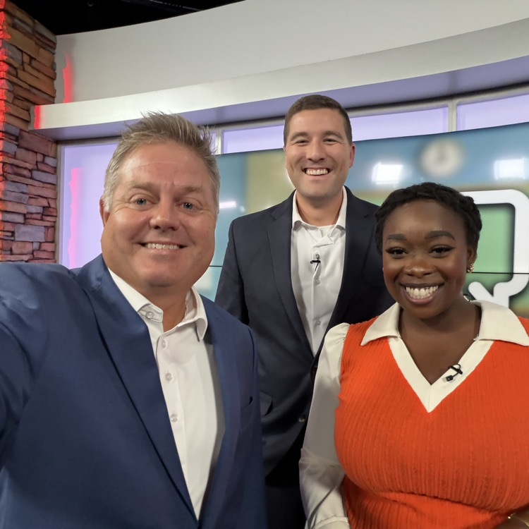 Dr Mouser with the News 25 crew on set