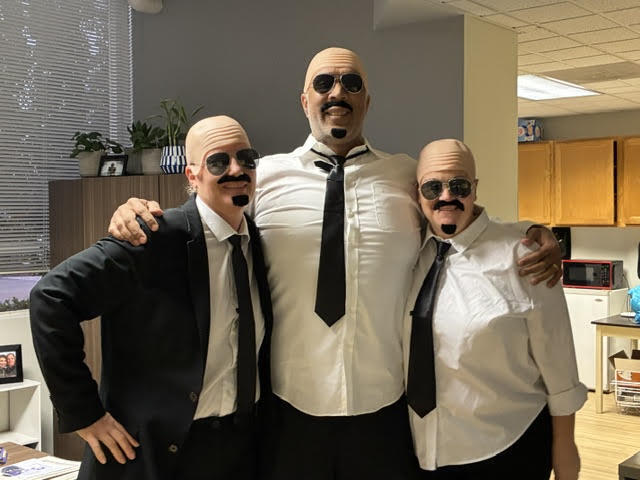 3 Pitbull customes in the office