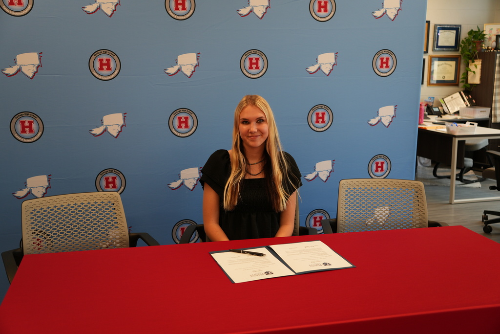 student signing teach bcs