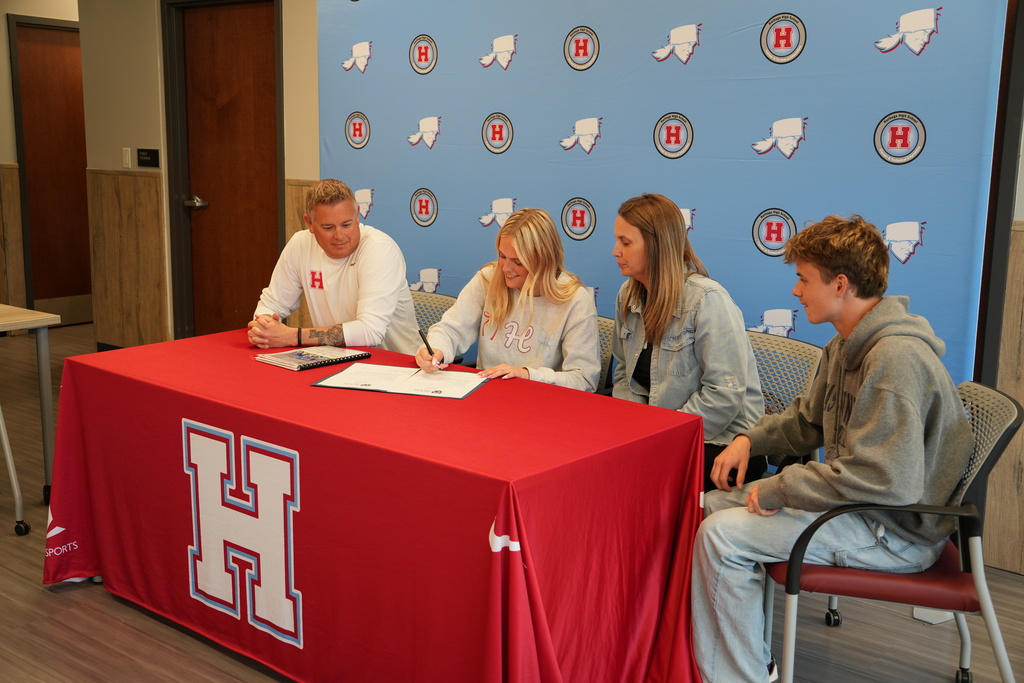 student signing teach bcs
