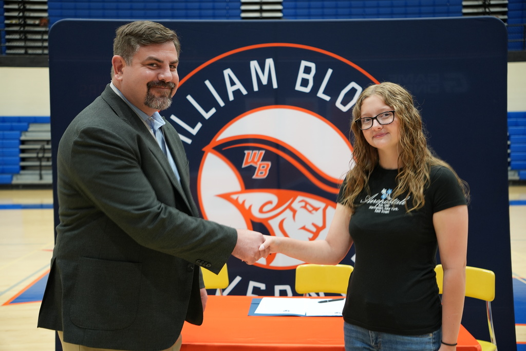 student signing teach bcs