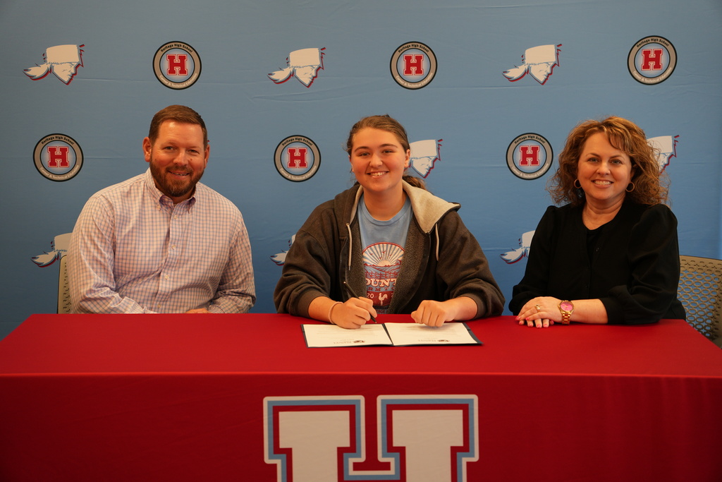 student signing teach bcs