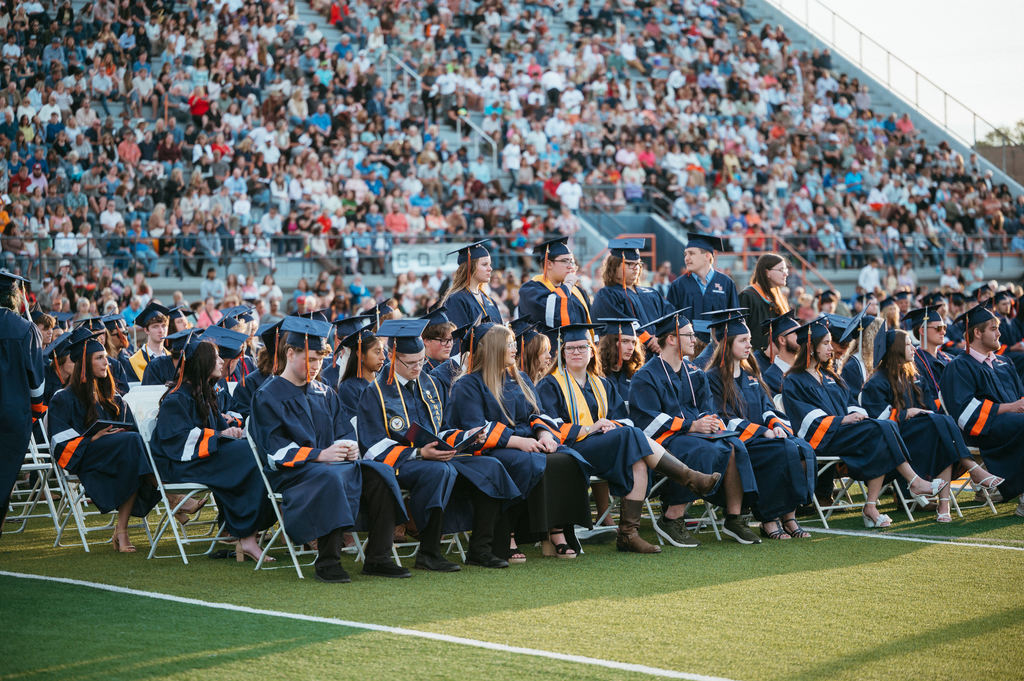 graduates sitting