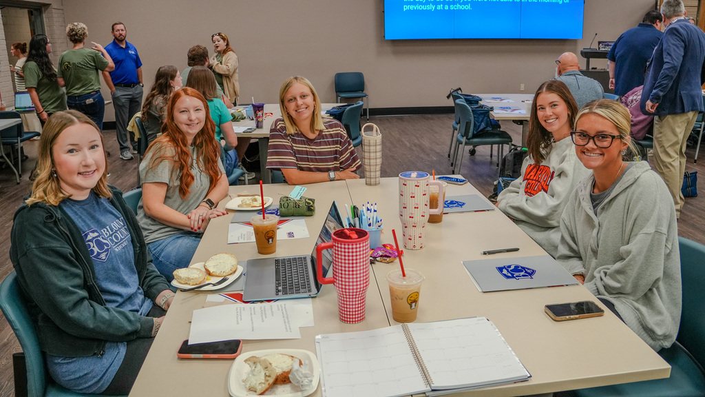 young teachers smiling