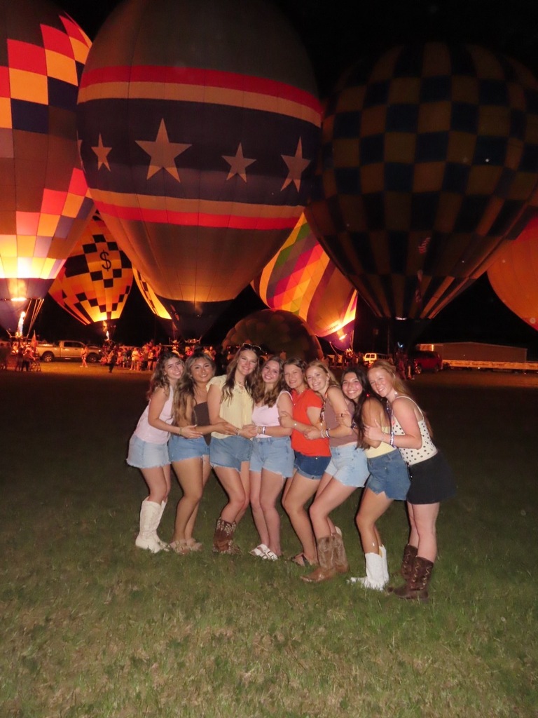 A group of girls at the hot air balloon festival
