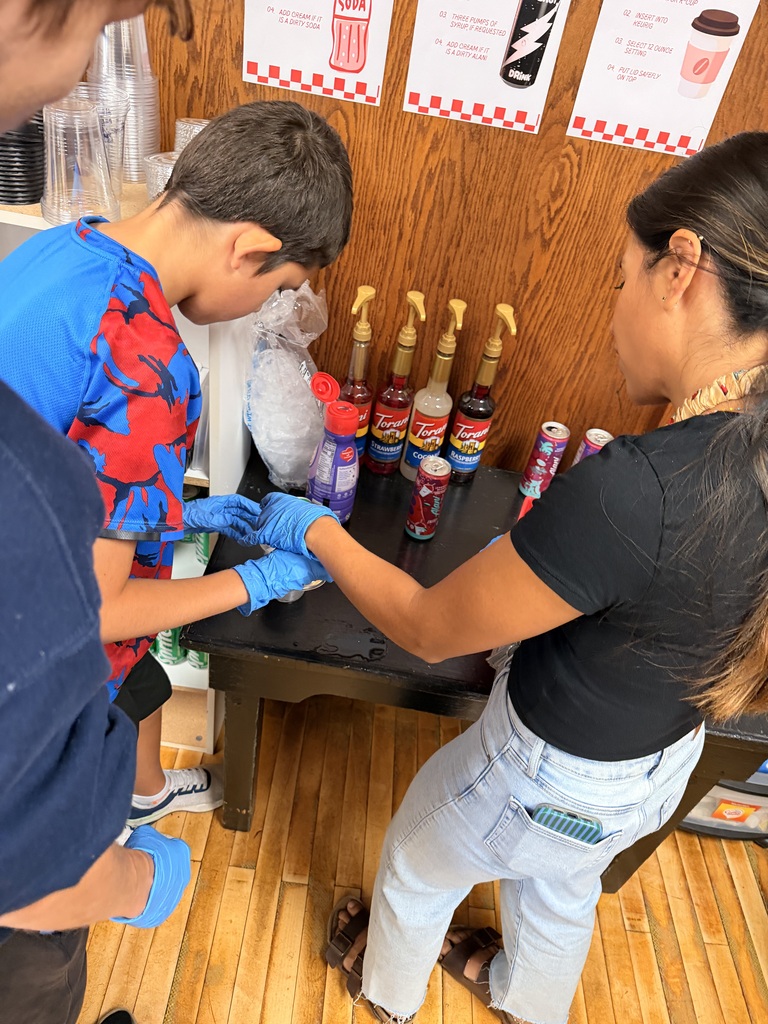 Student and teacher making coffee